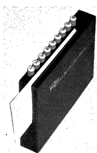 Fig. 3. typewriter and two magnetic-tape capsules 