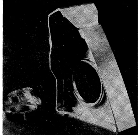 Fig. 22-Aircraft fitting machined under numerical control. 