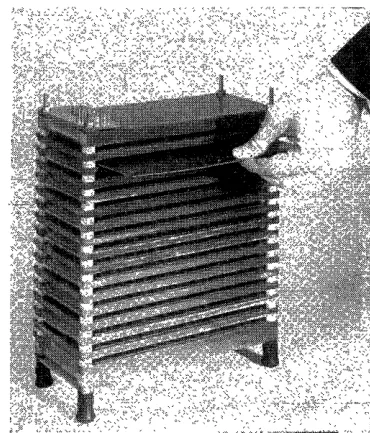 Fig. 6-Rear view of the 512-word memory module. The magnet board is being inserted. It is held against the memory frame by a spring
