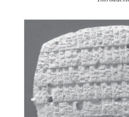 Fig. 1.2Sumerian clay tablet from 4200 years ago that documents barley rations issuedmonthly to adults and children