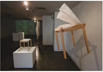 Figure 5.2: Stool Prototype #4. Exhibited at Craft ACT: Craft and Design Centre as part of Materials: Laser cut HDPE from discarded milk bottles (seat) combined with Tasmanian Oak from a reclaimed bed head (under structure)