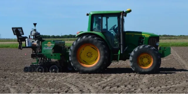 Figure 9: John Deere 6430 Tractor and Great Plains 3P606NT Drill fitted with a Kincaid Cone System used to plant the plot