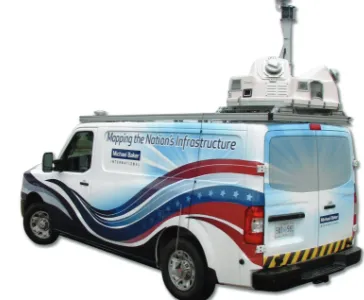 Figure 2-14, with several laser scanners on board, drives application. The mobile LiDAR vehicle shown in through a corridor and the overlapping scan data from the scanner array collects the data needed while the vehicle and scanner are in motion.