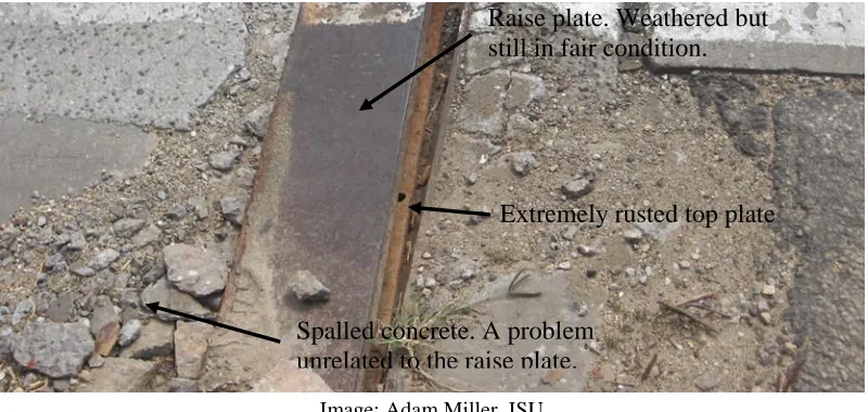 Figure 2.3. Rusted top plate beneath a raise plate showing relatively good condition on westbound US 20 over Catfish Creek in Cedar Rapids, Iowa 