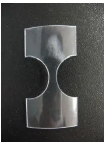 Figure 5 – Sample specimen, from left: a) before and b) after stress-strain test. 