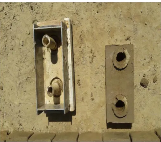 Fig -1: The Mould For Brick Making With A Brick Adjacent To It 