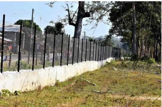 Fig. 7 An example of the mesh wire fence communities prefer to construct along the  forest-settlement border