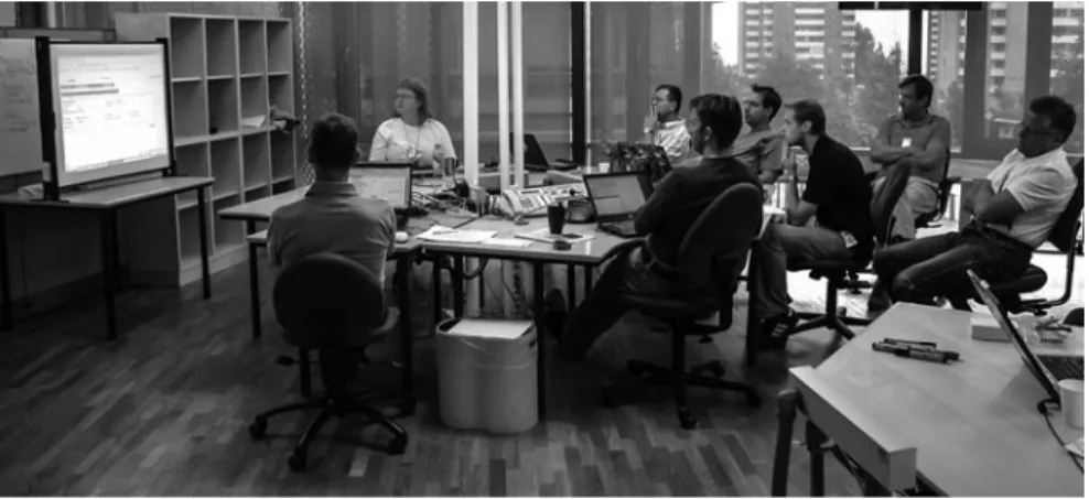 Fig. 11.3 Project kick off with development team, team facilitator, and customer responsible
