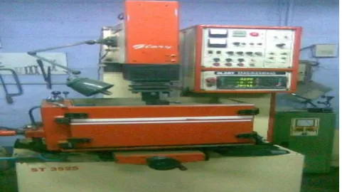 Fig. 1 (a) Electric Discharge Machine Setup   