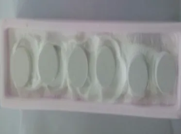 Figure 1: Pellets formed by hand press machine kept in the alumina boat for sintering process.