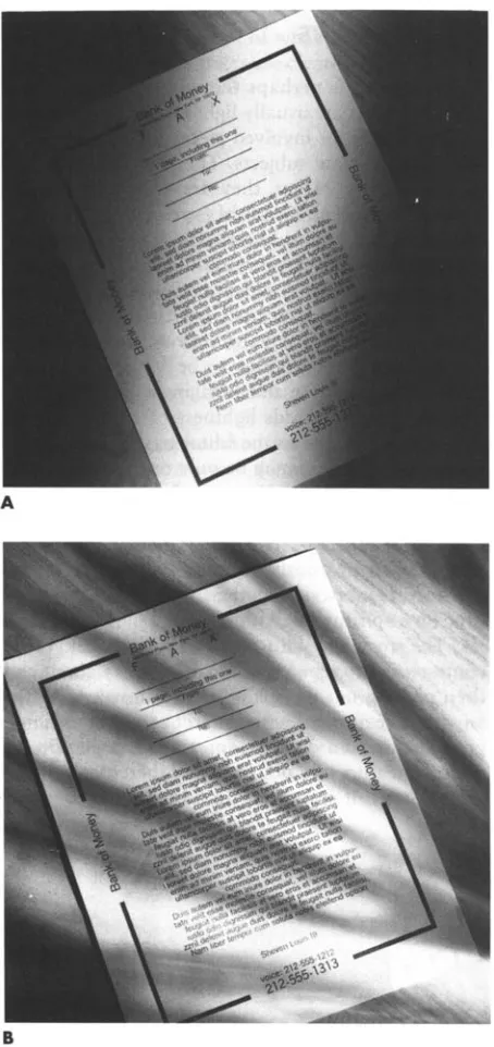 Figure 2-5Two alternatives to shooting this document square and ﬂat: (1) the paper is at an angle and highlighted with a shaft of light; (2) the light is shining through a water glass to create a pattern across the paper.