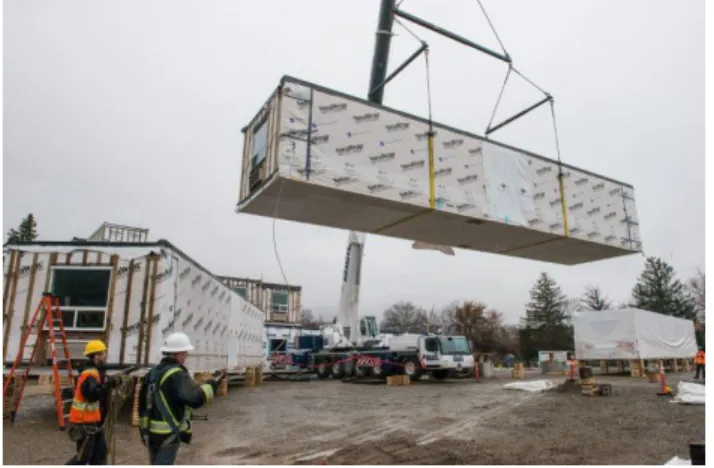 Figure 5- Module Being Lifted into Place On-site  Source- Electech Canada (2014) 