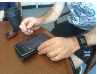 Figure 1. A participant shows his cycling data on his self-tracking app. 