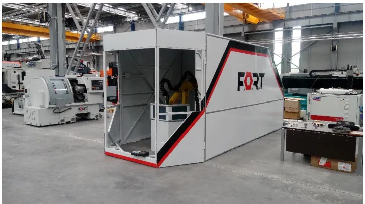 Fig. 3. A laser installation for powder weld deposition. 