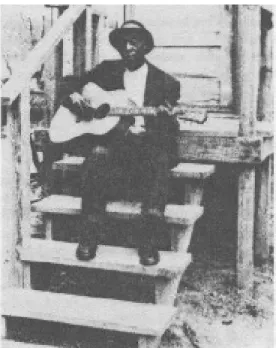 Fig. 10. Blackface: A fake Josephine   Fig. 11. Blackness: Blind Willie Johnson  Baker on a cover of Quick (MdK, 13)