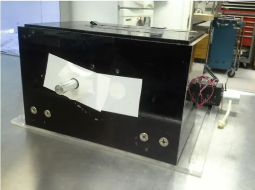 Figure 3: Testing Device.  Heated lever is visible in center, valve controlling juice flow visible at right
