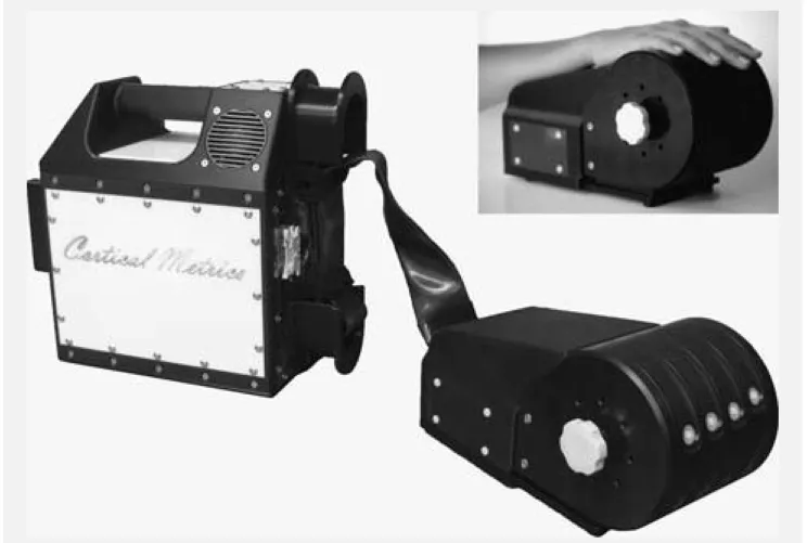 Figure 2.1: Four Site Vibrotactile Stimulator. Each of the four probe tips is positioned by rotating the four  independently-positioned drums to maximize contact between finger pads and the stimulator tips