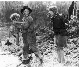 Figure 10  Ambrose Grimes (Spec O'Donnell) threatens to throw one of the children into the swamp  while Mother Mollie (Mary Pickford) reacts