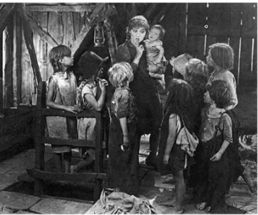 Figure 11  Mother Mollie (Mary Pickford) and the orphans in Sparrows. Photo courtesy of The Mary  Pickford Institute for Film Education
