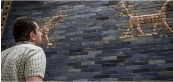 Figure 1: Syrian refugee admires the ancient Babylonian Ishtar Gate at Berlin’s Museum of the Ancient Near East