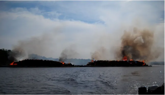 Figure	  1:	  Burning	  Barges	  of	  Wood,	  Arapiuns	  River,	  December	  2010 