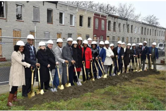Figure 4 Students and faculty break ground for new apartments as part of the East  Baltimore Development Initiative