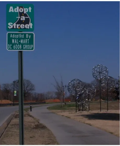 Figure 1.2 A road sign near a public park indicating “adoption” by a Walmart-affiliated group