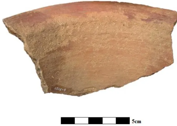 Figure 4-1.  Example of highland-style red slip decoration on interior lip of a rim. 