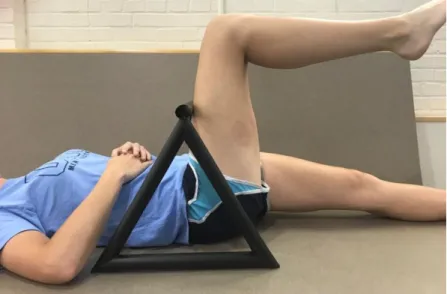 Figure 2: Range of Motion Starting Position.   Participants lay supine with the leg to be measured at 90  degrees of hip flexion and 90 degrees of knee flexion