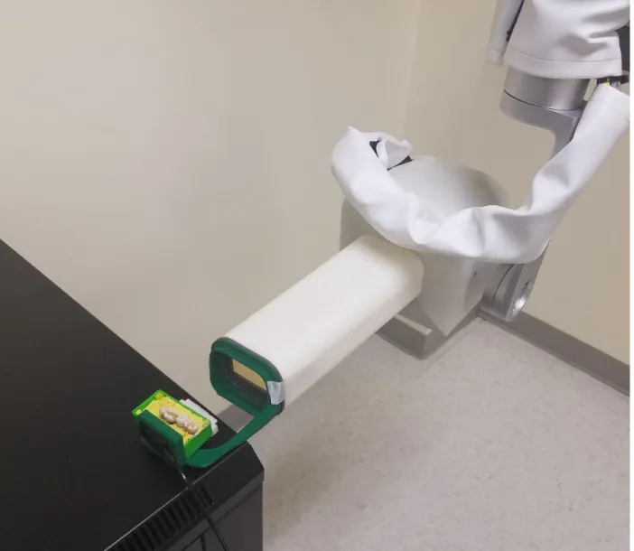Figure 4.  The s-IOT unit at the UNC School of Dentistry.  Four teeth are mounted in a plastic Lego block  using Play-Doh