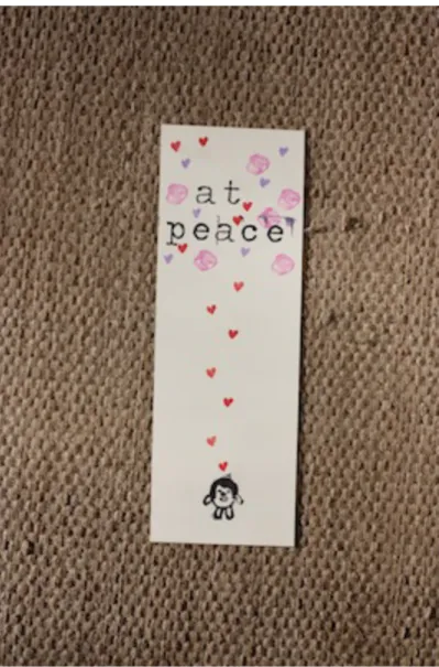 Figure	  3	  This	  bookmarker	  uses	  the	  phrase	  "at	  peace".	  