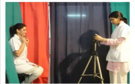 Fig. 1 Video camera set on a tripod at 4 ft distance from the subjectin sitting position