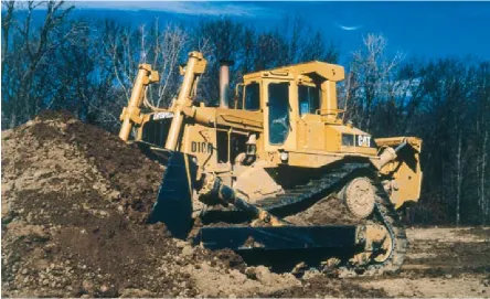 Figure 4‑2. Humans have designed, built, and used many tools and machines. (Caterpillar, Inc.)