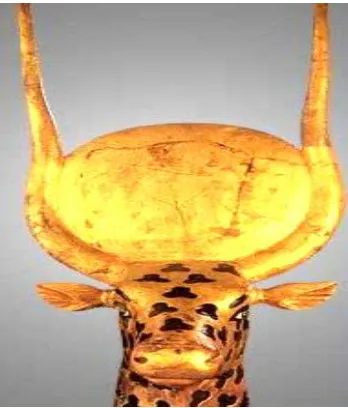 Fig. 13: b Face of the sacred cow of Tut's funerary bed.[30] 