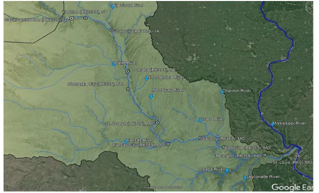 Figure 2.1: The Lower Missouri River, its main tributaries (blue arrows) and the USGS gaging stations used in this study (dots) (from USGS, google earth and GIS)