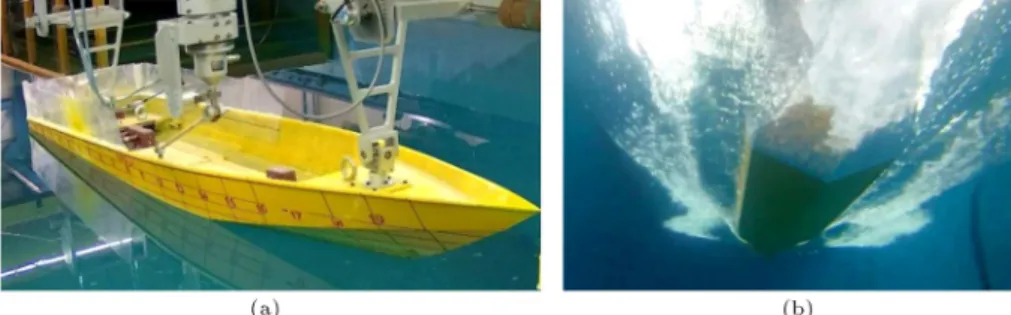 Figure 3. (a) Experimental setup of the model. (b) A view of the bottom of the vessel, which is used for determining the wetted lengths.