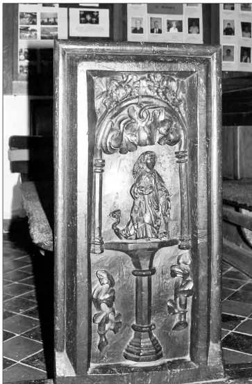 Fig. 3: Medieval bench end at Othery, Somerset, showing St Margaret with the dragon.