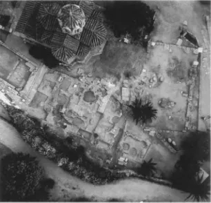 Figure 2. tions of Southeast Temple at upper right. Agora Mint. Church of the Holy Apostles at upper left, founda- Aerial view, 1979