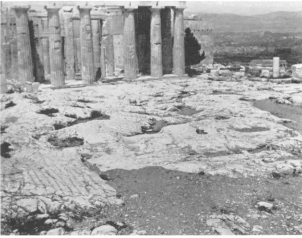 Fig. 24. Rock-cut grooves for good footing at 26, figure 1: their change in direction slhows that the Processional Way turned toward the court in front of the west fa9ade of the Parthenon 