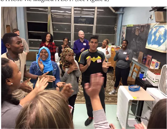 Figure 1. Graduate students and professor reading the newly crafted script to our high school student partners for the first time