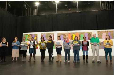 Figure 5. All of the graduate students and professor collectively performing a read-ing of our script for our first public performance at our university