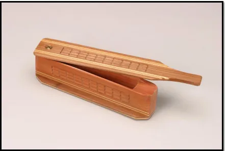 Figure 2.5  M.L. Lynch Model No. 102 box call with grooved side panels. One side of         the box was worked to make the sounds of a hen while the other side was         used to make the sounds of a gobbler