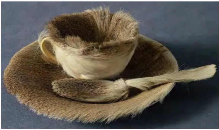 Figure 13: Sue Jackson, glove from Fits Like a Glove series (including detail), 2010, vintage glove, rabbit fur, thread, dimensions variable. 
