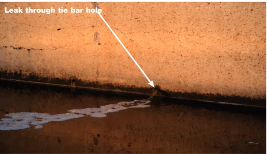 Figure 7 Tank 12 after the incident showing liquid leaking through tie bar hole 