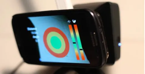Figure 1.    ArcAid App running a on smartphone which is attached to the bow using the specifically designed ArcAid holder