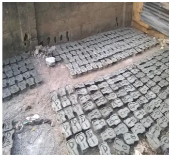 Figure 2: Production and curing of the SDA interlocking paving stone  