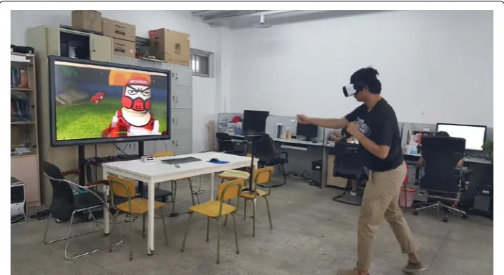 Fig. 9 A VR boxing game developed using the proposed wireless multiple Kinect sensors selection system