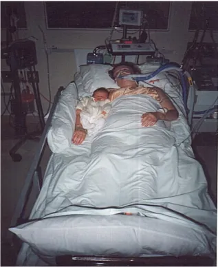 Figure 1. Tania with her four-day-old baby girl, Taylor, delivered while  