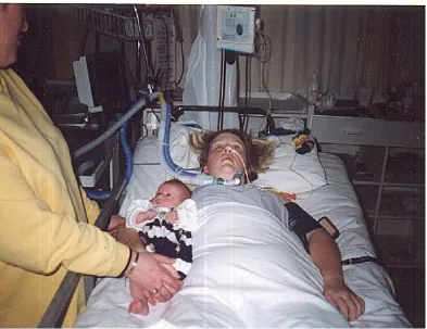 Figure 2. Taylor with her still paralysed mother now four months later. 