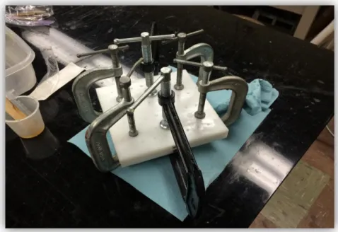 Figure 12: C-clamps were added to the mold to induce pressure on the  samples 
